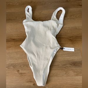 Vitamin A one piece Sz 6